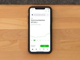 white samsung android smartphone on brown wooden table