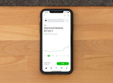 white samsung android smartphone on brown wooden table