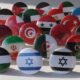 a bunch of different colored balls with flags on them