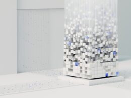 a white cube with blue squares