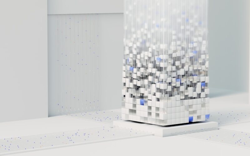 a white cube with blue squares