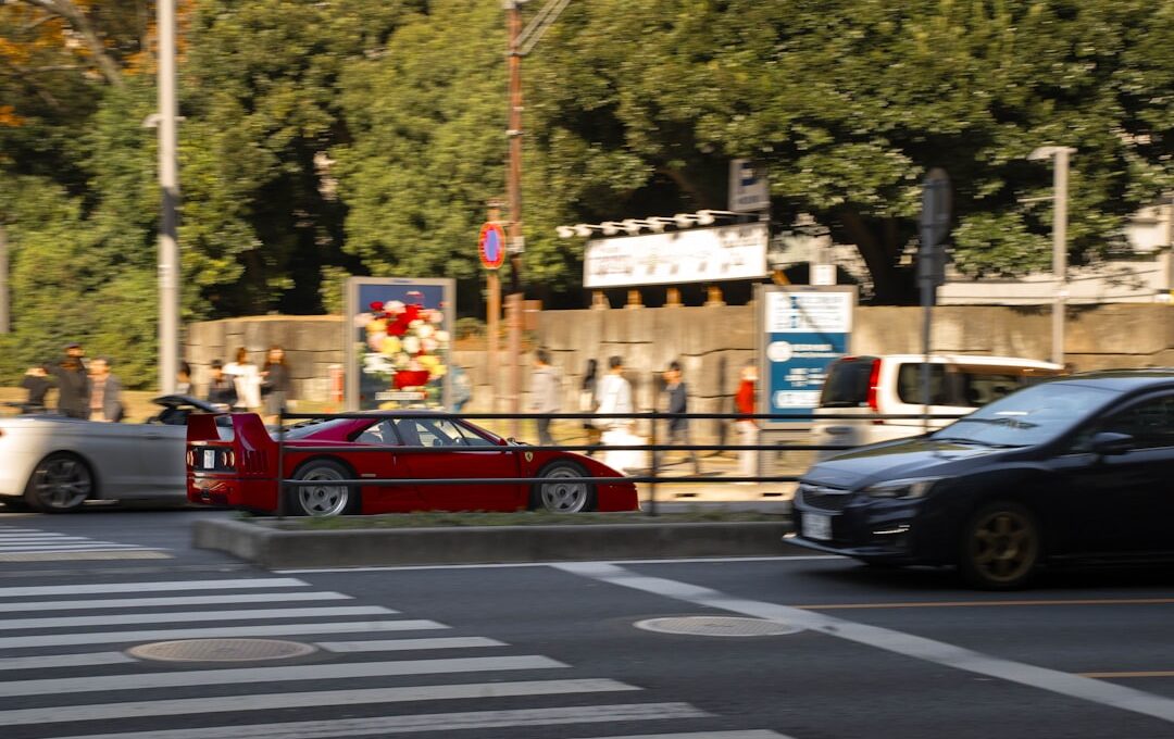 A couple of cars that are sitting in the street