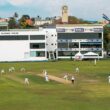 A cricket match is being played at the stadium.