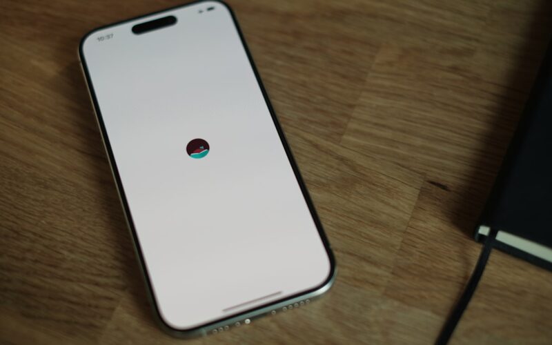 A close up of a cell phone on a table