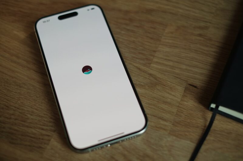 A close up of a cell phone on a table