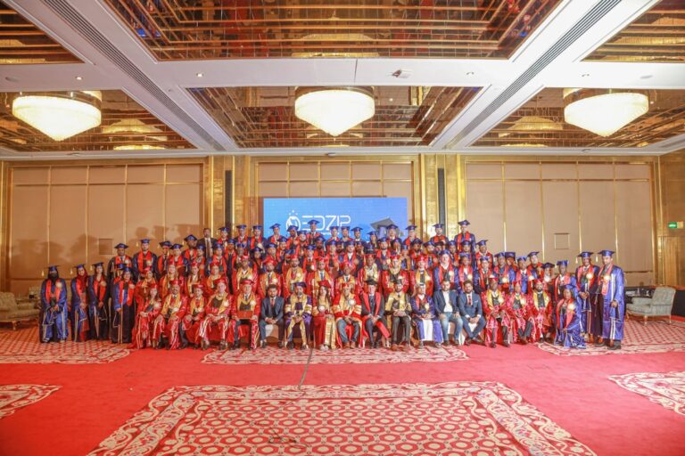 Graduation ceremony with many happy graduates.