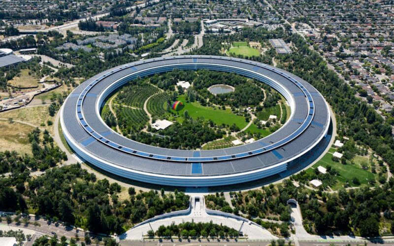 An aerial view of a circular building in a city