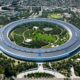 An aerial view of a circular building in a city