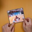 A person playing a video game on a table