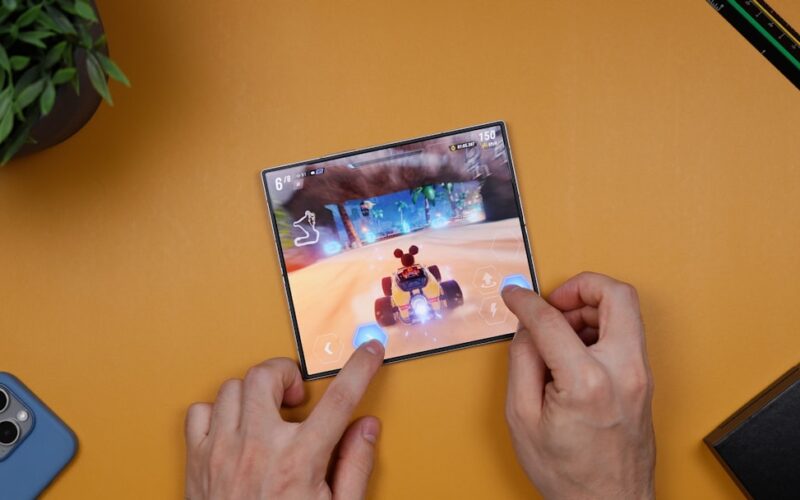 A person playing a video game on a table
