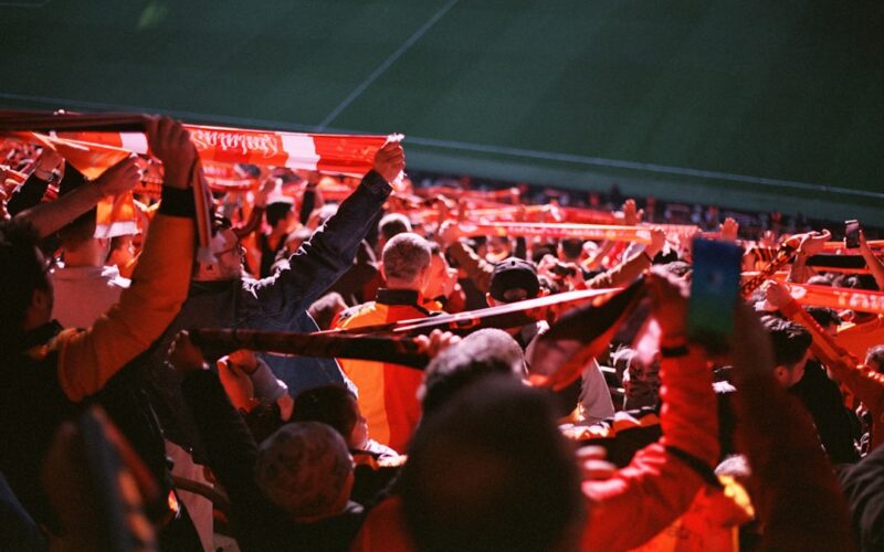 A large group of people sitting in a stadium