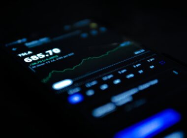 black android smartphone displaying 11 00