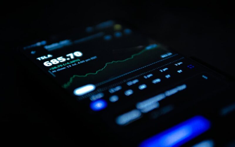 black android smartphone displaying 11 00
