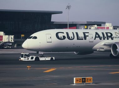 A large jetliner sitting on top of an airport tarmac