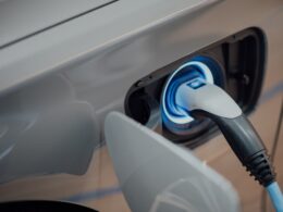 electric vehicle charger plugged into car