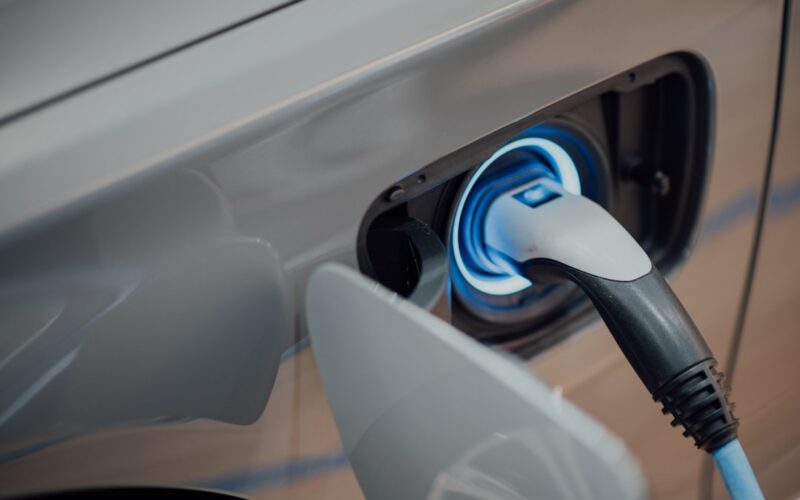 electric vehicle charger plugged into car