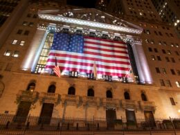 a large flag from the ceiling of a building
