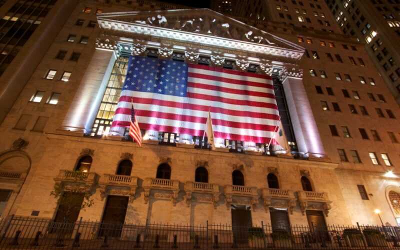 a large flag from the ceiling of a building