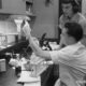 Two people working in a laboratory with equipment