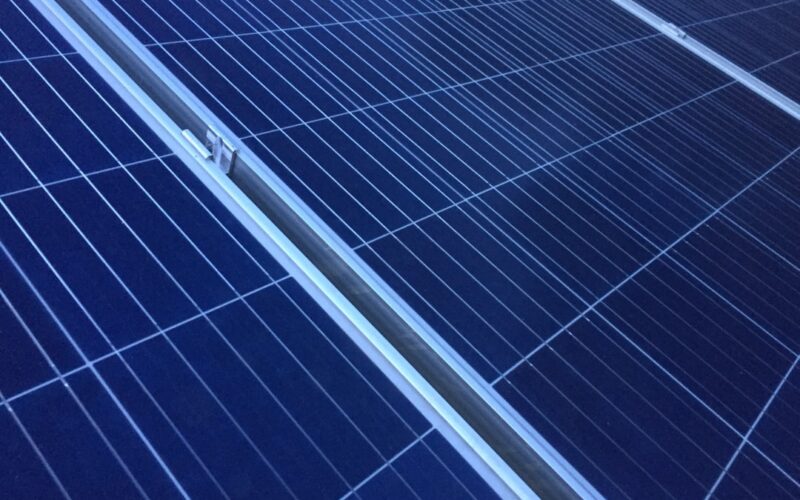 architectural photography of blue and white satellite panel