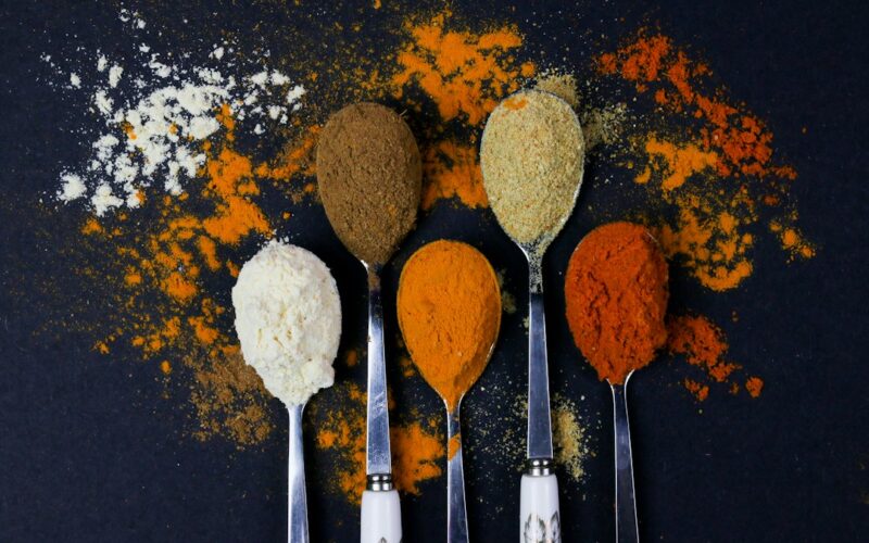 brown powder on silver spoon