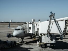 a plane is being loaded with luggage