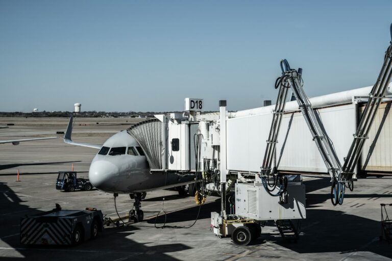 a plane is being loaded with luggage
