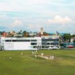 A cricket game is being played on a field