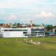 A cricket game is being played on a field