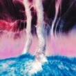 Abstract swirling colors with a red orb in the sky
